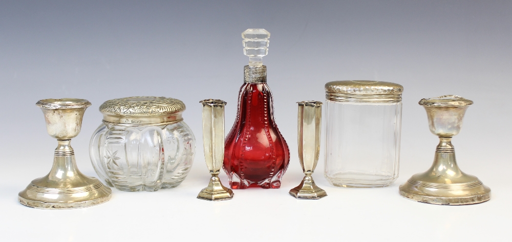 An Edwardian silver topped cut glass dressing table jar by William Comyns, London 1903, of