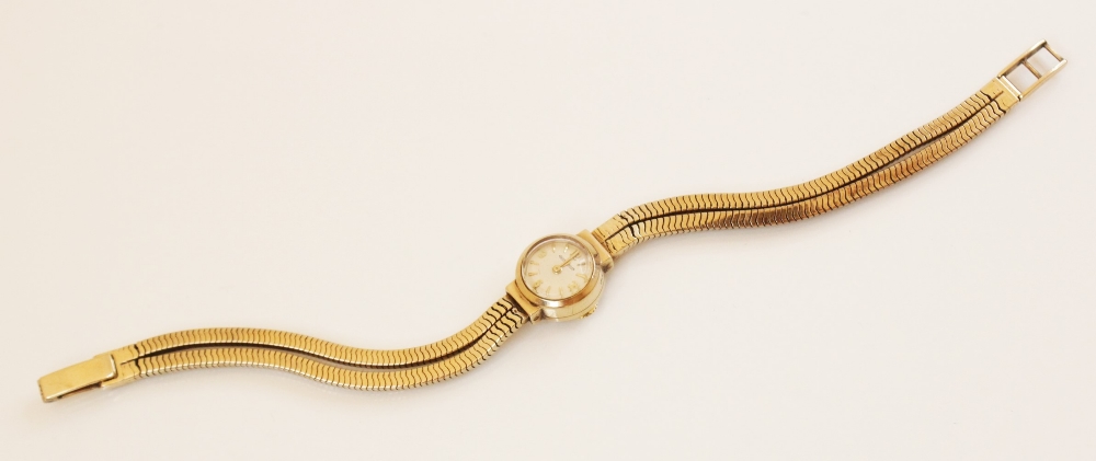 A lady's vintage 9ct Jaeger LeCoultre wristwatch, the circular gold toned dial with Arabic