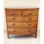 A Victorian mahogany bow front chest of drawers, formed from two short over three long graduated and