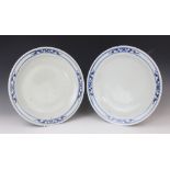 A pair of Chinese porcelain blue and white chargers, late 19th century, each of circular form and