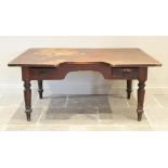 A 19th century stained pine estate/clerks desk, the cleated rectangular top inverted to one side