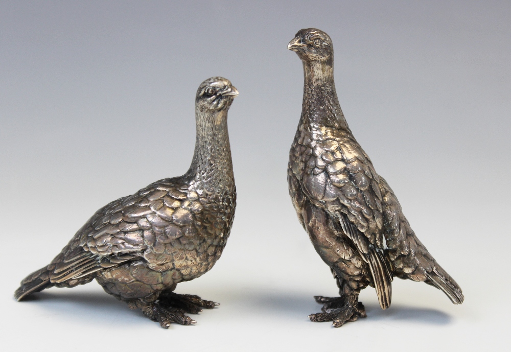 A pair of Patrick Mavros silver grouse, each modelled in a standing position with feather effect