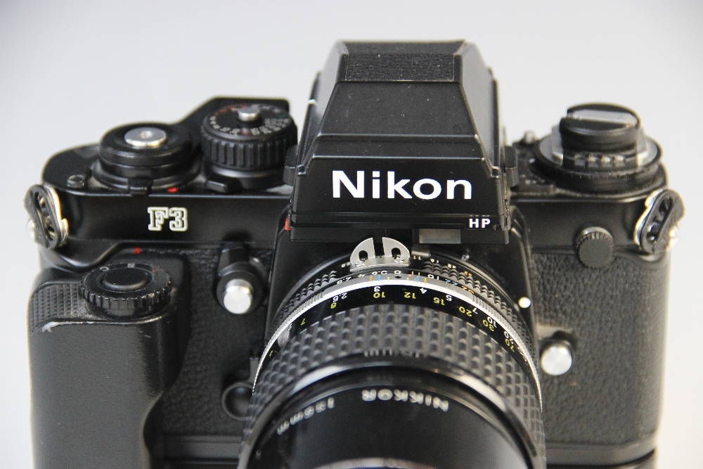 A Nikon F3 35mm SLR camera serial number 1887470, mid 20th century, fitted with a Nikkor 135mm 1: - Image 2 of 3