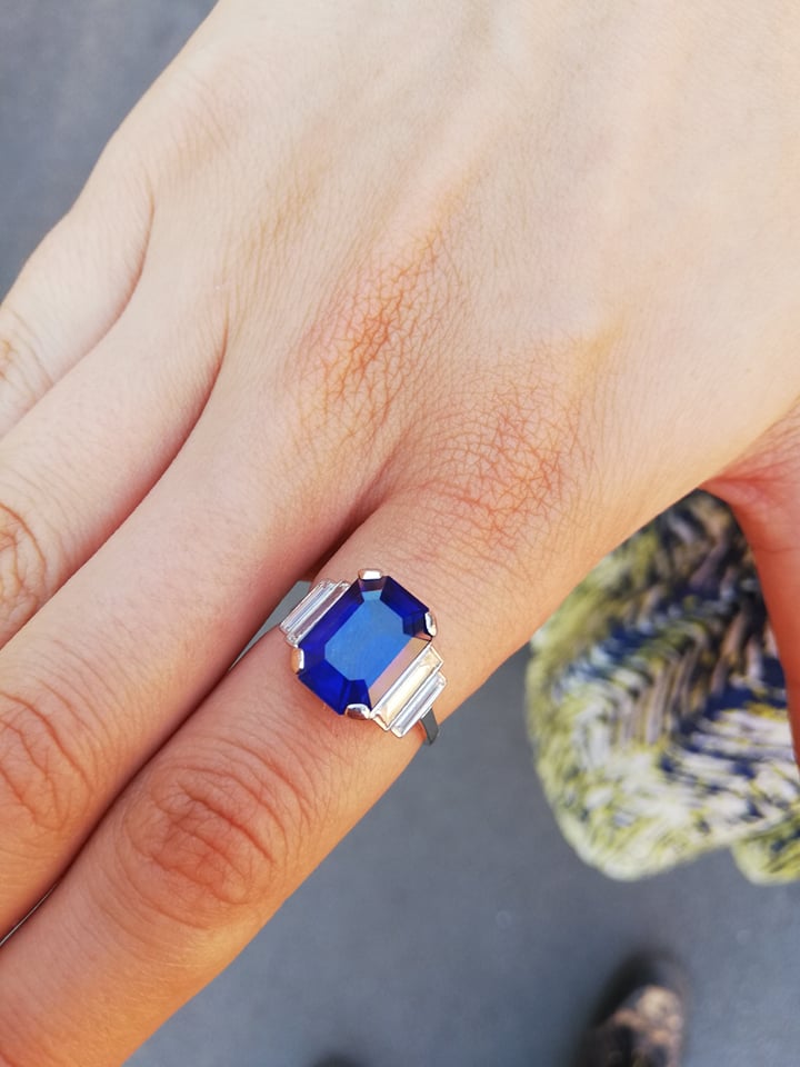 An Art Deco sapphire and diamond ring, the central octagonal step cut sapphire (measuring 11.79mm - Image 11 of 20