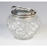 A George V cut glass sugar bowl and silver cover, marks for W. Coulthard Ltd, Birmingham 1931, the