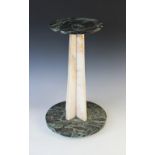 A green marble and onyx pedestal stand, early 20th century, the circular base with central cruciform