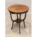A late 19th century rosewood occasional table, the circular top on four curvilinear legs, united