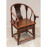 A Chinese stained wood altar chair, 20th century, the horse shoe shaped top rail with scrolled