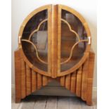 An Art Deco walnut display cabinet by S. Spanglett Ltd, of glazed odeonesque design with two