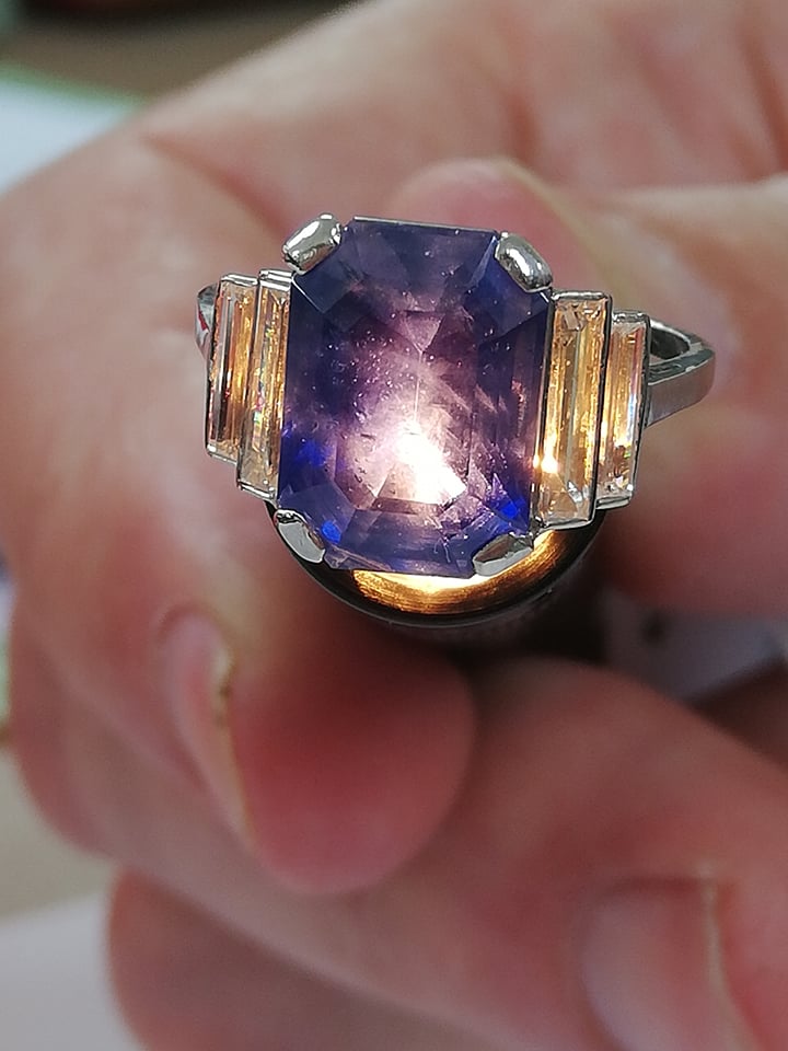 An Art Deco sapphire and diamond ring, the central octagonal step cut sapphire (measuring 11.79mm - Image 13 of 20