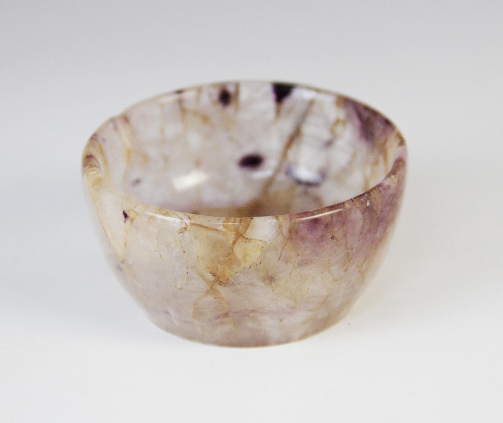 A blue john agate bowl, of plain polished circular form with central welled interior, 5.5cm diameter