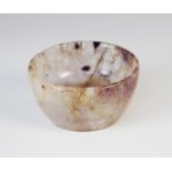 A blue john agate bowl, of plain polished circular form with central welled interior, 5.5cm diameter