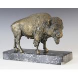 A bronze figure of a bison, 20th century, naturalistically modelled standing, unsigned, set to a