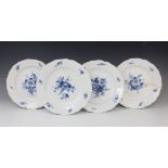 Four Meissen blue and white plates, 19th century, each decorated with central floral spray, with