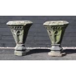 A pair of Gothic sandstone planters, possibly converted from roof finials, each of hexagonal