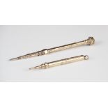 A Victorian 9ct gold mechanical pencil, of hexagonal form with engraved decoration, bloodstone set