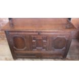An 18th century oak coffer, with fielded panel front