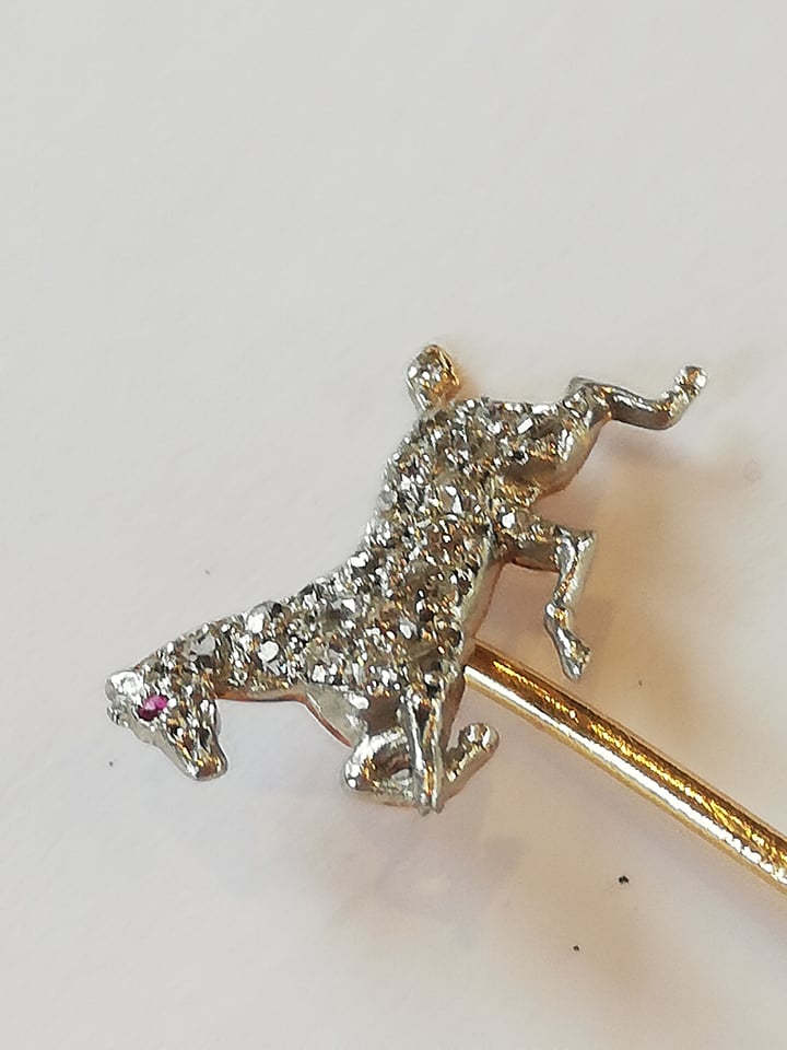 An early 20th century diamond and ruby horse stick pin, the horse modelled in gallop and set with - Image 3 of 4