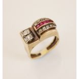 An Art Deco 'Odeonesque' diamond and ruby ring, the stylized head designed as a tapering arch set