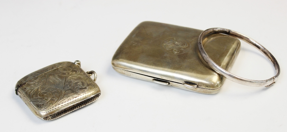 A George V silver cigarette case by Deakin & Francis, Birmingham 1918, of rectangular form with