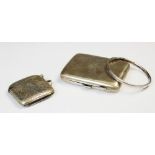 A George V silver cigarette case by Deakin & Francis, Birmingham 1918, of rectangular form with
