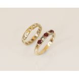 A ruby and diamond 9ct gold ring, comprising three round mixed cut rubies and a round brilliant