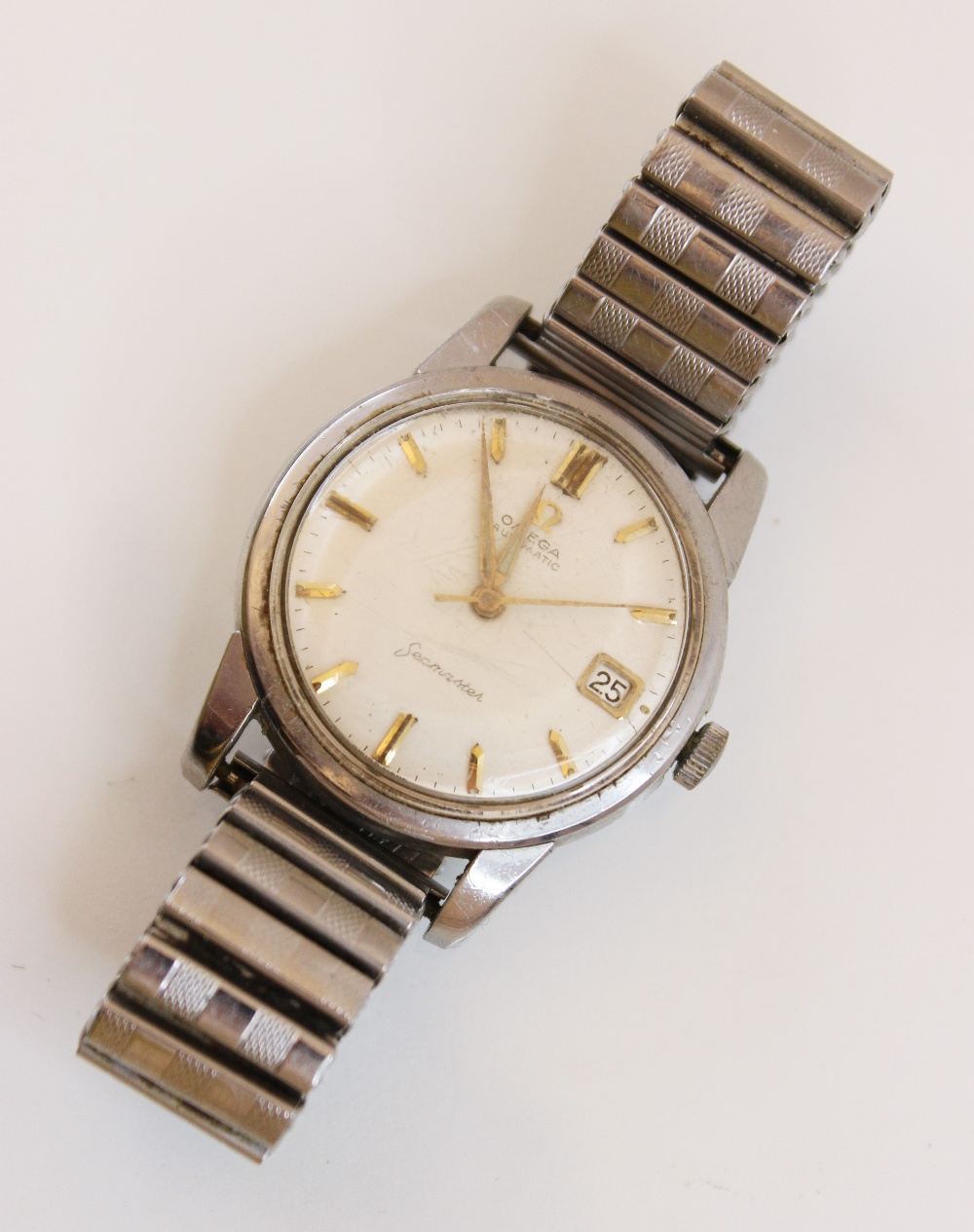 A gentleman's Omega Seamaster automatic stainless steel wristwatch, cream dial with gilt baton