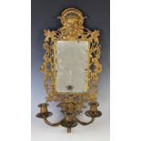 A gilt brass mirror back girandole, late 19th century, the rectangular bevelled mirror plate
