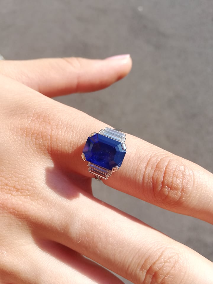 An Art Deco sapphire and diamond ring, the central octagonal step cut sapphire (measuring 11.79mm - Image 12 of 20