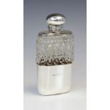 A Victorian cut glass silver mounted hip flask by George Edwin Walton, Birmingham 1896, of rounded