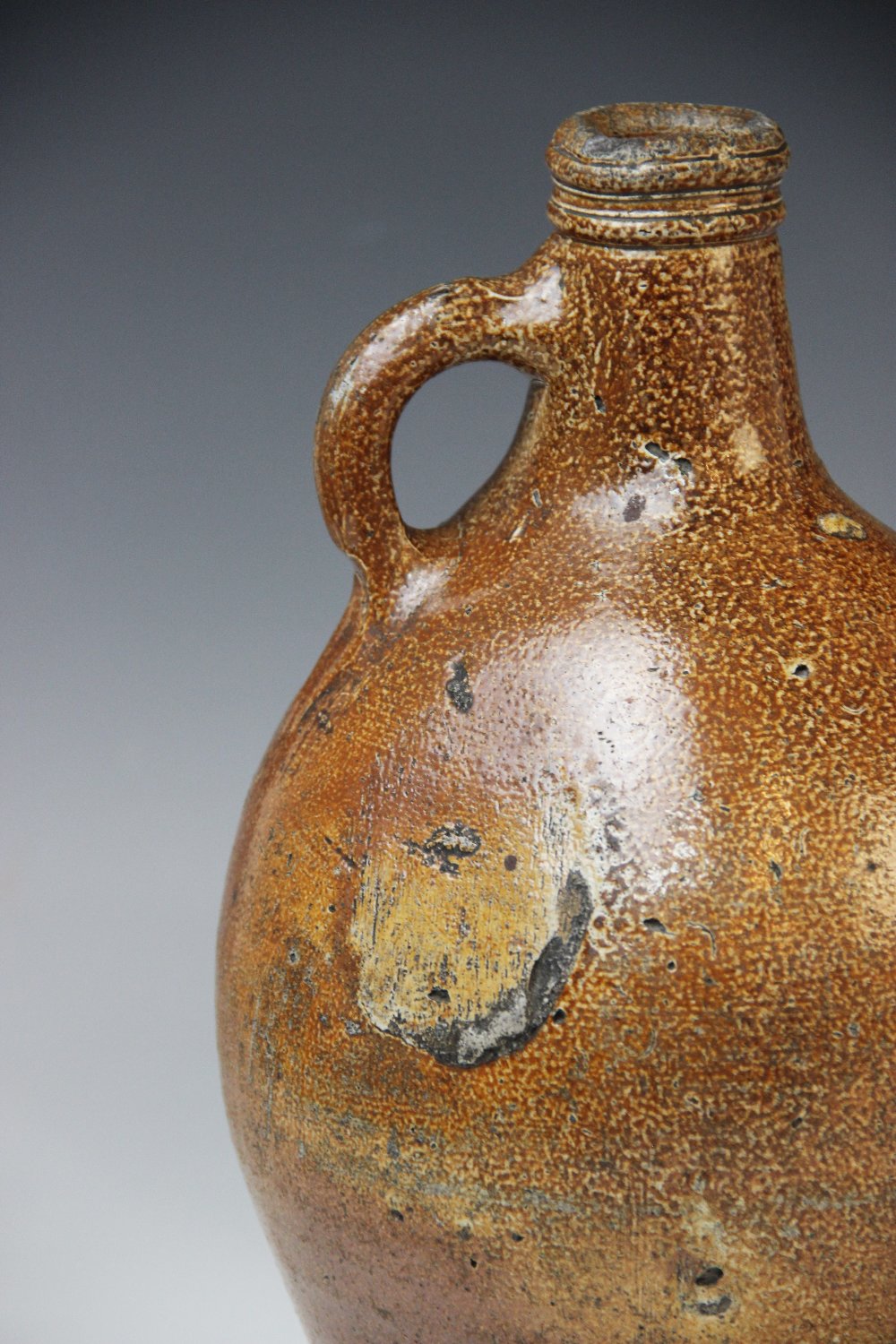 A black glazed Jackfield type water jug, late 18th century, of baluster form with applied loop - Image 3 of 5