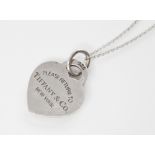 A Tiffany & Co silver heart pendant marked 'Please return to Tiffany & Co. New York', 26mm x 21mm,