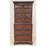 A George III style mahogany chest on chest of small proportions, the upper chest with a dentil