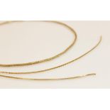 A yellow metal herringbone chain, with spring ring and loop fastening stamped '9K', 42.5cm long,