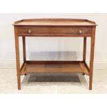 An early 19th century mahogany side table, the rectangular top with a three quarter gallery above