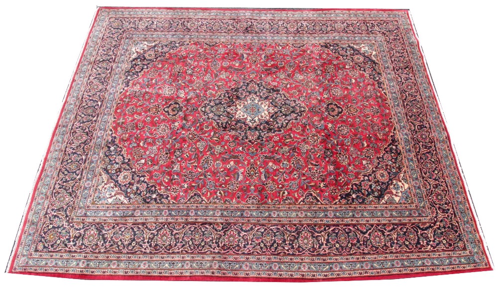 A very large red ground Persian Kashmir carpet, with traditional design, 293cm x 387cm