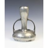 An Art Nouveau pewter vase from the 'Homeland' range by Walker & Co, the hammered body of gourd form