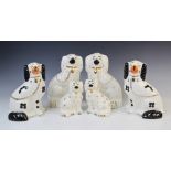 Two pairs of Beswick spaniels, 20th century, comprising; model 1378-4, each 24cm high (one at