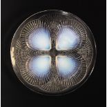 A Lalique 'Coquilles' plate, early 20th century, designed by René Lalique (1860-1945), the clear