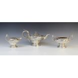 A William IV three-piece silver tea service by John Wakefield, London 1832, comprising teapot, sugar