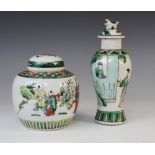 A Chinese porcelain famille verte vase and cover, 19th century, of baluster form, 21cm high, with