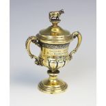 A George V miniature silver gilt cup and cover by Elkington & Co, Birmingham 1930, of baluster