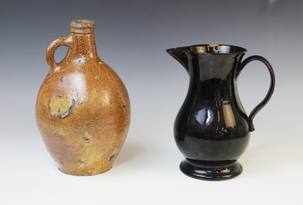 A black glazed Jackfield type water jug, late 18th century, of baluster form with applied loop - Image 2 of 5