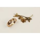 An early 20th century yellow metal cultured pearl set floral sprig brooch, stamped '15ct' to