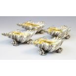 A set of four silver plated shell salts by Elkington & Co, each realistically modelled as a shell