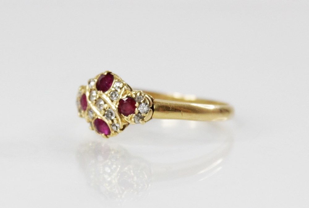 An Edwardian ruby and diamond 18ct gold ring, the quatrefoil head set with four untested round mixed - Image 3 of 6
