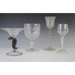 A glass chalice of large proportions, 19th century, of wine glass form with blown knopped stem on