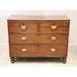 An early 19th century chest of drawers, formed from two short and two long drawers, applied with