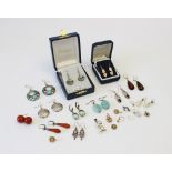 A selection of Victorian and later earrings, to include a pair of sun-spangled amber drop