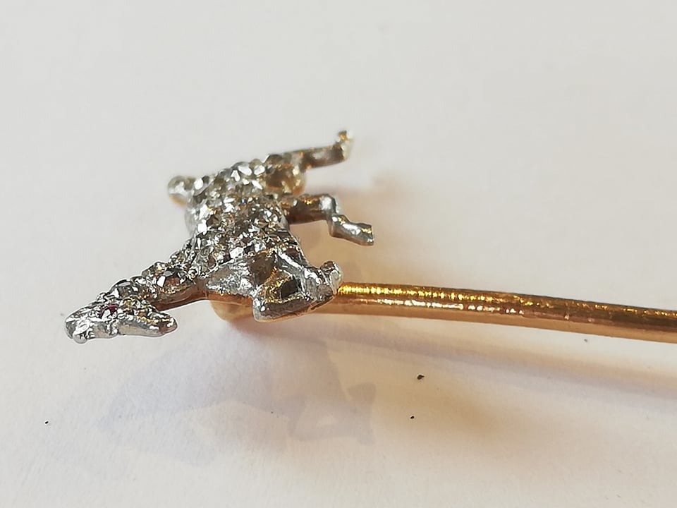 An early 20th century diamond and ruby horse stick pin, the horse modelled in gallop and set with - Image 4 of 4